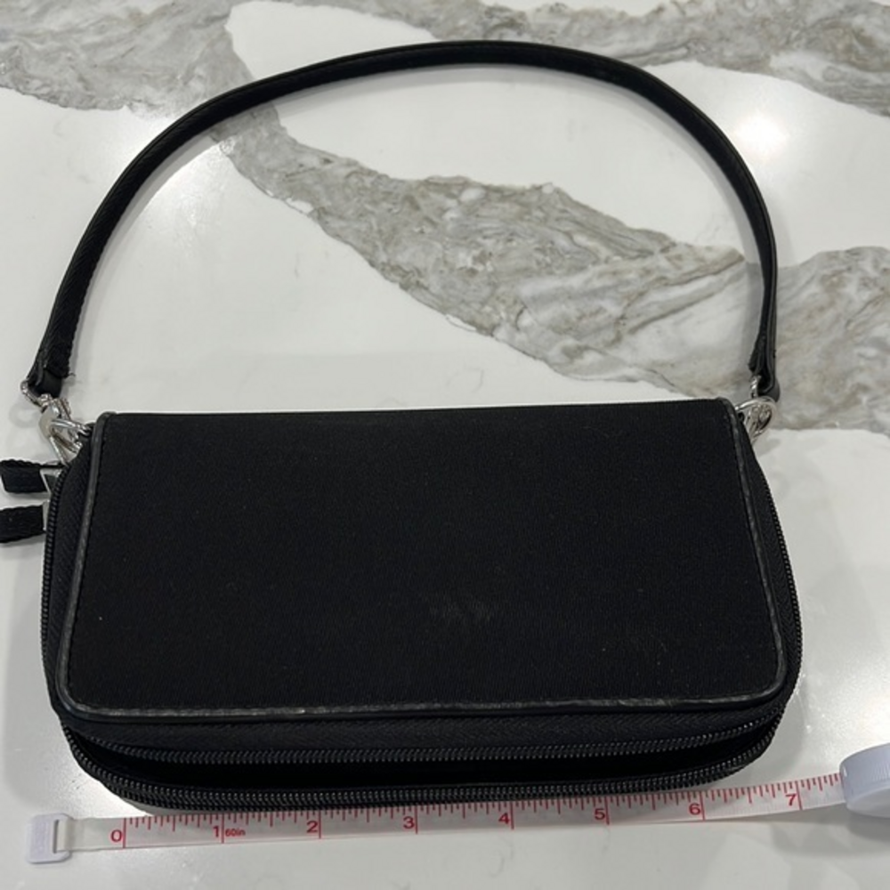 NWOT the Limited brand black zip up wallet purse.
